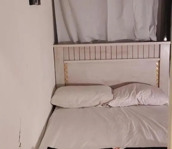 Couples Room With Window Smart Tv Fridge