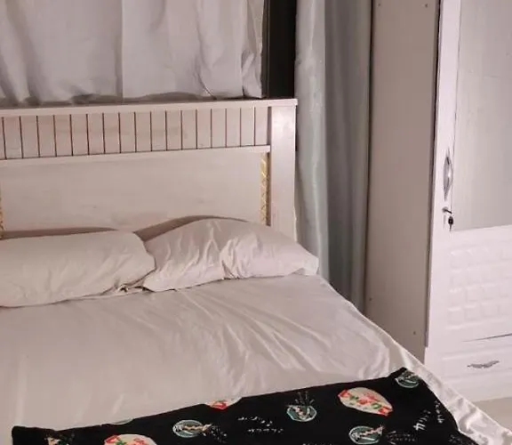 Couples Room With Window Smart Tv Fridge